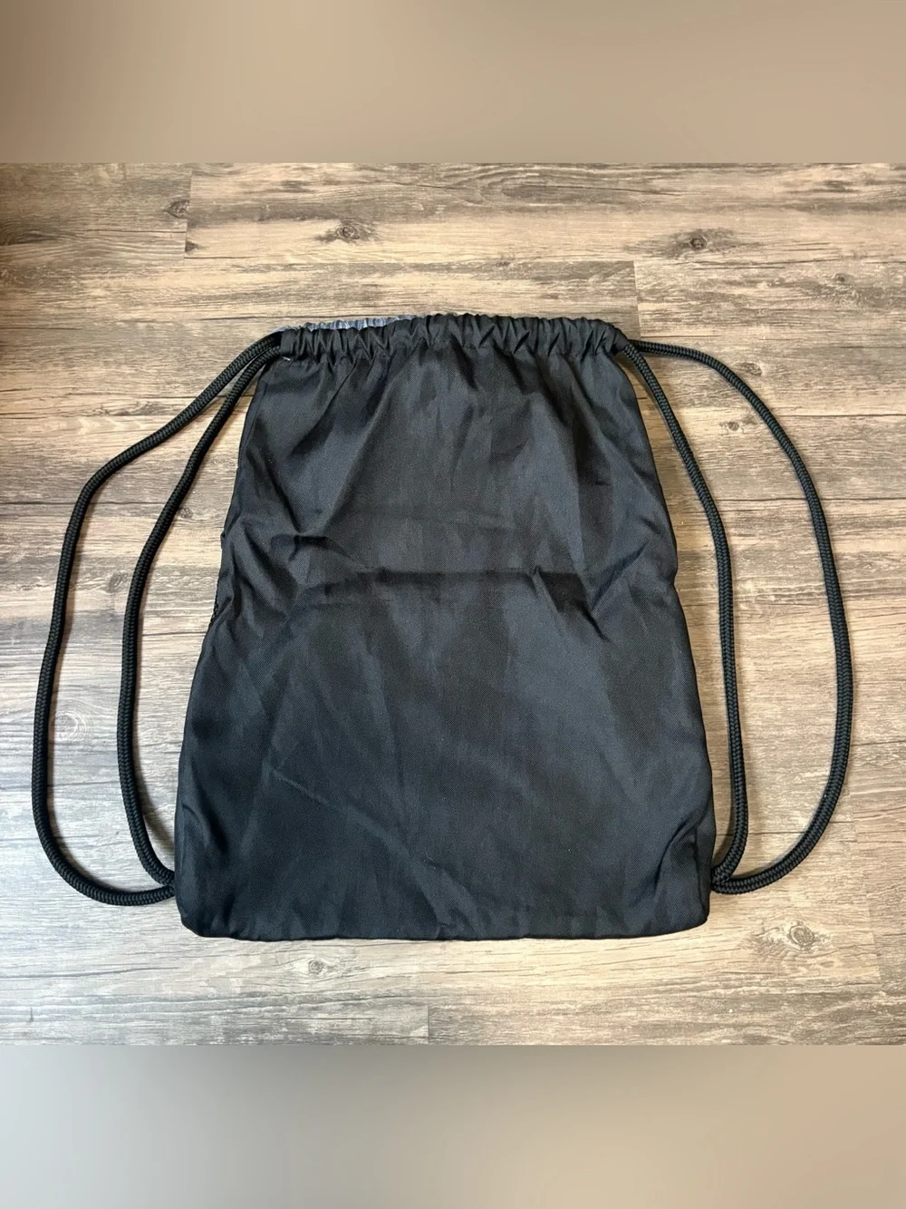 adidas Black and Silver Drawstring Backpack with Front Zip Pocket